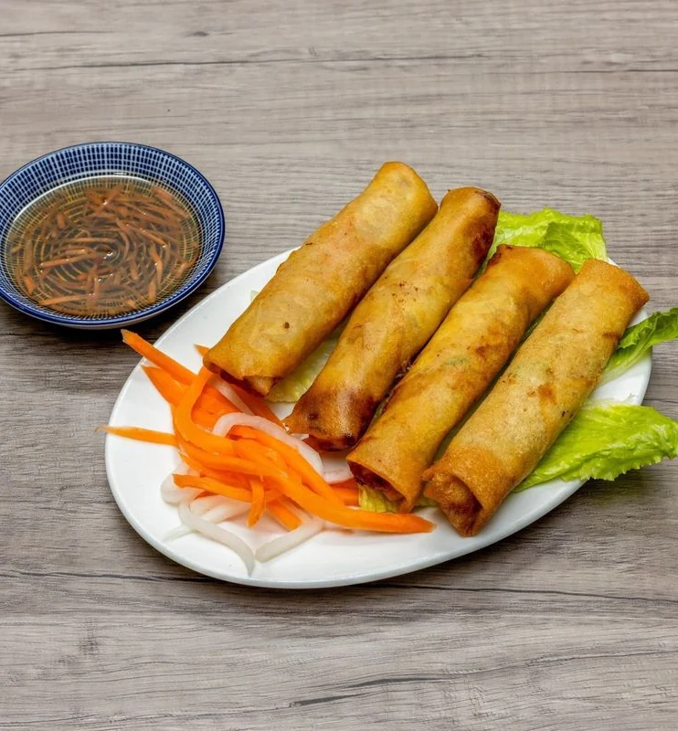 Crispy rolls with dipping sauce at Bep & Brew in Airdrie, AB
