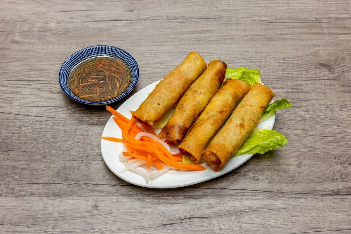 Crispy rolls with dipping sauce at Bep & Brew in Airdrie, AB
