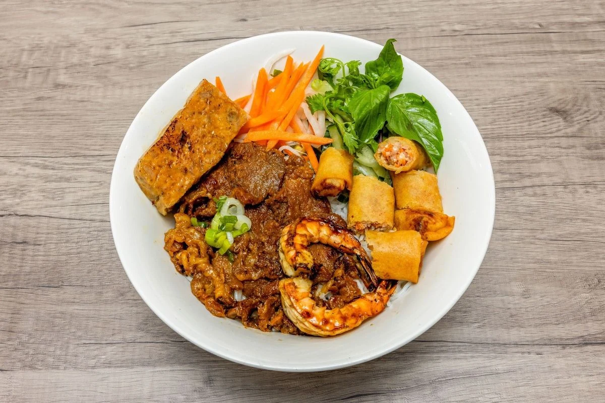 Special Vermicelli with grilled pork, shrimp, spring rolls and pork meatballs at Bep & Brew in Airdrie, AB